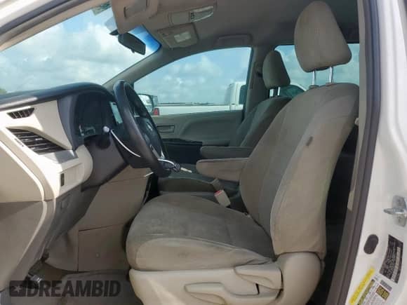 2017 Toyota Sienna L with VIN 5TDZZ3DC2HS843175, listed as a Copart auction lot 69047445 with 148,083 mi miles and Salvage title. Bid and sale history available at DreamBid. Image 7.