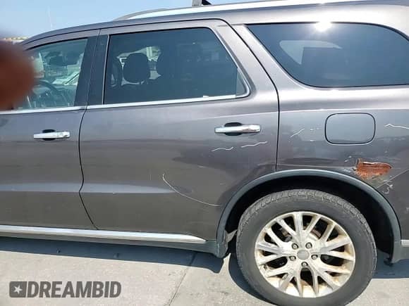 2014 Dodge Durango Citadel with VIN 1C4RDJEG4EC508548, listed as a Copart auction lot 68997555 with 141,476 mi miles and Salvage title. Bid and sale history available at DreamBid. Image 14.