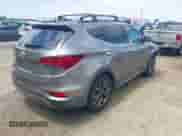 2018 Hyundai Santa Fe Ultimate with VIN 5NMZW4LAXJH069328, listed as a IAAI auction lot 42487378 with 51,859 mi miles and . Bid and sale history available at DreamBid. Image 4.