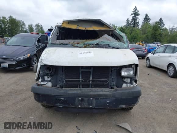 2013 Chevrolet Express Cargo z VIN 1GCWGGBA9D1163007, wystawiony jako IAAI lot #42438809 z przebiegiem Nie podano mil oraz . Historia ofert i sprzedaży dostępna na DreamBid. Obrazek 10.