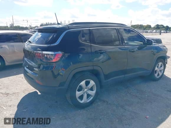 2020 Jeep Compass Latitude with VIN 3C4NJCBB4LT253364, listed as a IAAI auction lot 41565377 with 60,551 mi miles and . Bid and sale history available at DreamBid. Image 4.