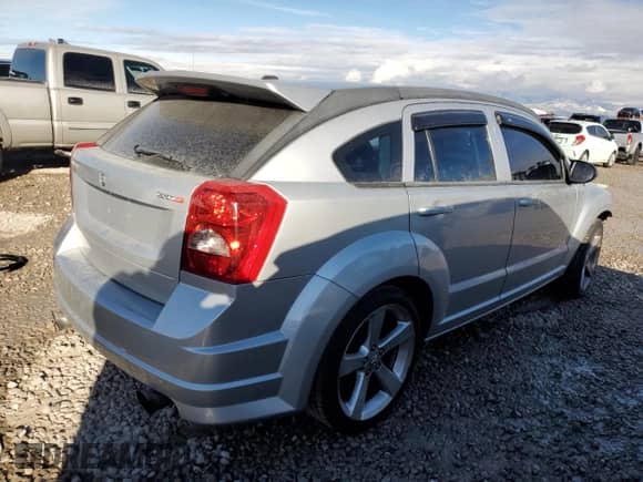 2008 Dodge Caliber с VIN 1B3HB68FX8D664451, выставлен на аукционе Copart как лот 84281964 с пробегом 118 320 миль миль и Списание • Salvage title. История ставок и продаж доступна на DreamBid. Изображение 3.