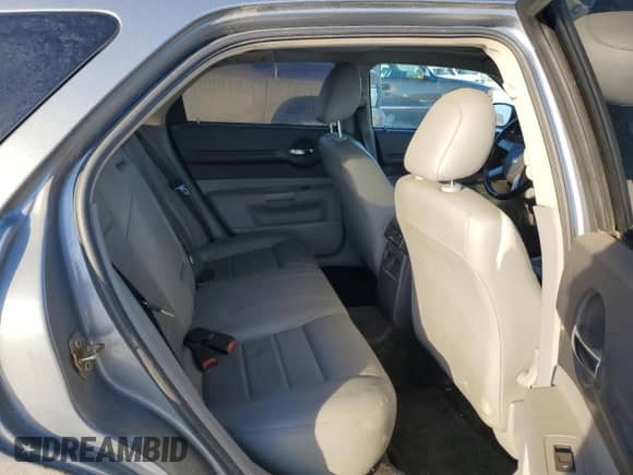 2006 Dodge Magnum R/T с VIN 2D4GV57256H187683, выставлен на аукционе Copart как лот 87879585 с пробегом 260 895 миль миль и Списание • Salvage title. История ставок и продаж доступна на DreamBid. Изображение 10.