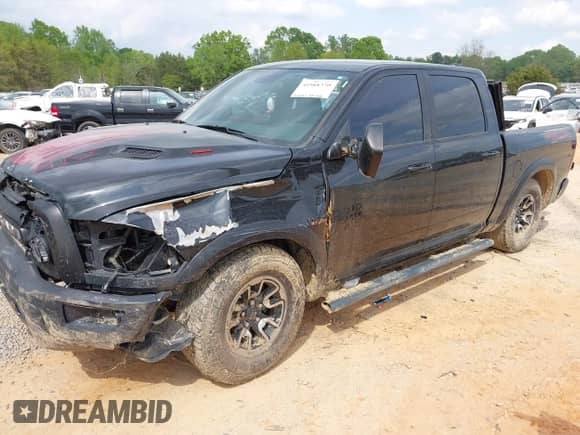 2018 Ram 1500 Rebel with VIN 1C6RR7YT4JS151036, listed as a IAAI auction lot 41988370 with 72,587 mi miles and . Bid and sale history available at DreamBid. Image 18.