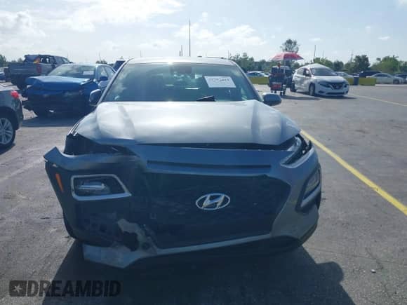 2021 Hyundai Kona SE z VIN KM8K12AA6MU705288, wystawiony jako IAAI lot #39764414 z przebiegiem 75 528 mil mil oraz . Historia ofert i sprzedaży dostępna na DreamBid. Obrazek 11.