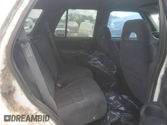 1997 Chevrolet Blazer LS with VIN 1GNDT13W7V2250580, listed as a Copart auction lot 62598535 with 169,860 mi miles and Clean title. Bid and sale history available at DreamBid. Image 10.