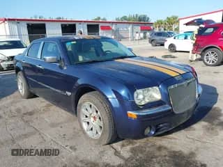 2005 Chrysler 300 300C AWD with VIN 2C3AK63H05H672425, listed as a IAAI auction lot 42224241 with 143,185 mi miles and . Bid and sale history available at DreamBid. Image 1.