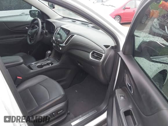 2021 Chevrolet Equinox Premier with VIN 3GNAXNEV5MS160043, listed as a IAAI auction lot 42109564 with 36,808 mi miles and . Bid and sale history available at DreamBid. Image 5.