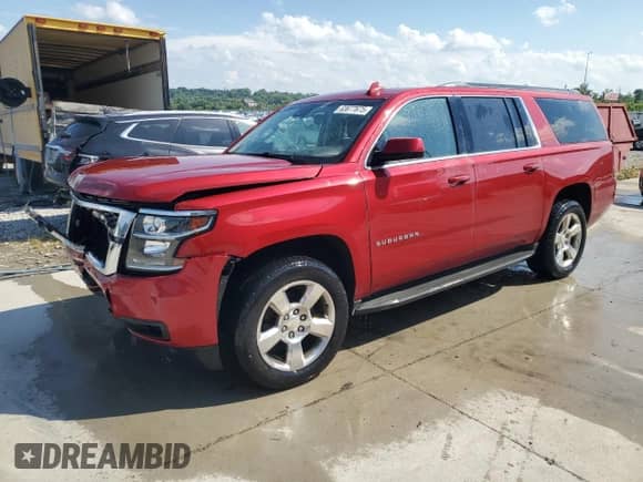 2015 Chevrolet Suburban LT with VIN 1GNSKJKC2FR643607, listed as a Copart auction lot 63677675 with 151,061 mi miles and Salvage title. Bid and sale history available at DreamBid. Image 1.