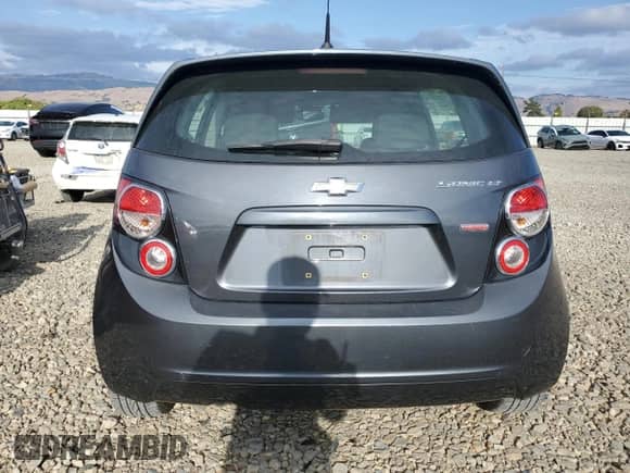 2013 Chevrolet Sonic LT с VIN 1G1JC6SB2D4127806, выставлен на аукционе Copart как лот 84817105 с пробегом 139 896 миль миль и Чистый • Clean title. История ставок и продаж доступна на DreamBid. Изображение 6.