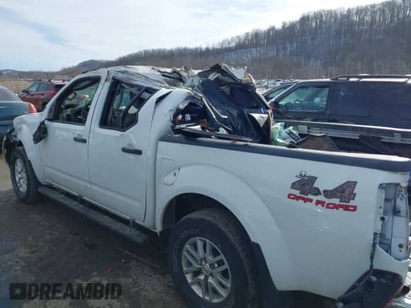 2016 Nissan Frontier SV with VIN 1N6AD0EV8GN703711, listed as a IAAI auction lot 41444646 with 178,409 mi miles and . Bid and sale history available at DreamBid. Image 6.