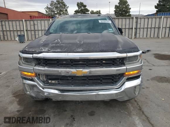 2017 Chevrolet Silverado 1500 LT with VIN 3GCPCREH9HG198058, listed as a Copart auction lot 86384304 with 178,036 mi miles and Salvage title. Bid and sale history available at DreamBid. Image 5.