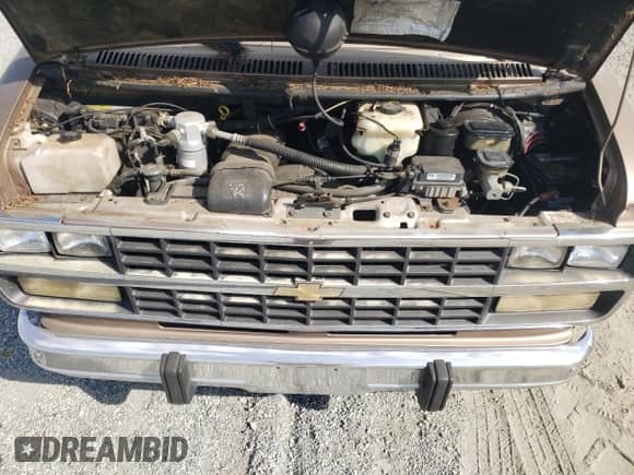 1995 Chevrolet Chevy Van with VIN 1GBEG25K9SF175004, listed as a Copart auction lot 77952694 with 217,649 mi miles and Salvage title. Bid and sale history available at DreamBid. Image 12.