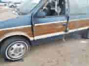 1991 Dodge Grand Caravan with VIN 1B4GK54R4MX558183, listed as a IAAI auction lot 41604086 with 210,400 mi miles and . Bid and sale history available at DreamBid. Image 6.