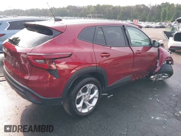 2024 Chevrolet Trax LS with VIN KL77LFE25RC100753, listed as a IAAI auction lot 42915541 with 29,428 mi miles and . Bid and sale history available at DreamBid. Image 4.