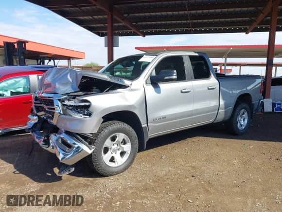 2022 Ram 1500 Big Horn with VIN 1C6SRFBT3NN357571, listed as a IAAI auction lot 43077485 with 49,467 mi miles and . Bid and sale history available at DreamBid. Image 17.