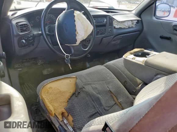 2000 Ford F-150 XL with VIN 1FTRX18L7YNB50273, listed as a Copart auction lot 70456245 with Not provided miles and Salvage title. Bid and sale history available at DreamBid. Image 8.