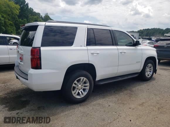 2020 Chevrolet Tahoe LT with VIN 1GNSCBKCXLR143208, listed as a Copart auction lot 67521985 with 105,720 mi miles and Salvage title. Bid and sale history available at DreamBid. Image 3.