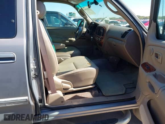2002 Toyota Tundra Limited z VIN 5TBBT48192S263813, wystawiony jako IAAI lot #43491595 z przebiegiem 376 267 mil mil oraz . Historia ofert i sprzedaży dostępna na DreamBid. Obrazek 5.