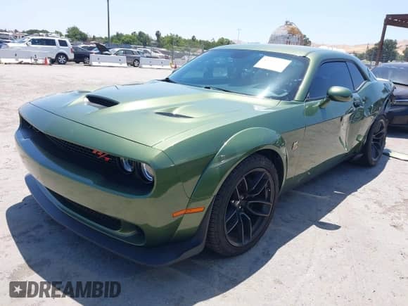 2022 Dodge Challenger R/T Scat Pack Widebody z VIN 2C3CDZFJ8NH177621, wystawiony jako IAAI lot #42358022 z przebiegiem 19 076 mil mil oraz . Historia ofert i sprzedaży dostępna na DreamBid. Obrazek 18.