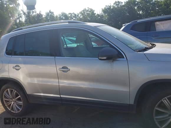 2014 Volkswagen Tiguan SEL with VIN WVGAV3AX2EW554773, listed as a IAAI auction lot 42547252 with 162,573 mi miles and . Bid and sale history available at DreamBid. Image 13.