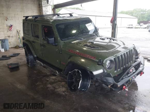 2021 Jeep Wrangler Unlimited Rubicon with VIN 1C4HJXFG4MW543254, listed as a IAAI auction lot 42316180 with 50,696 mi miles and . Bid and sale history available at DreamBid. Image 1.