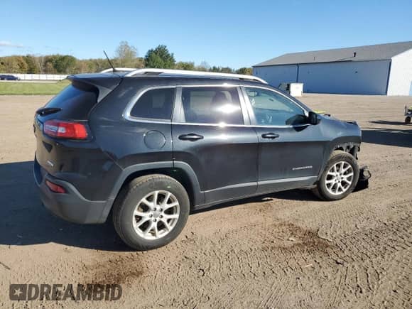 2014 Jeep Cherokee Latitude with VIN 1C4PJMCS4EW181608, listed as a Copart auction lot 82442135 with 198,324 mi miles and Salvage title. Bid and sale history available at DreamBid. Image 3.