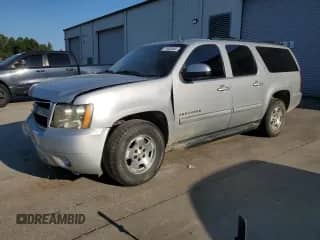 2011 Chevrolet Suburban LT with VIN 1GNSCJE09BR121047, listed as a Copart auction lot 71432645 with 188,387 mi miles and Salvage title. Bid and sale history available at DreamBid. Image 1.