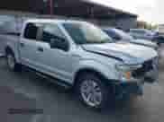 2018 Ford F-150 XL with VIN 1FTEW1CP8JKC70201, listed as a IAAI auction lot 42620912 with 124,499 mi miles and . Bid and sale history available at DreamBid. Image 1.