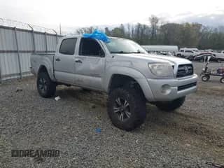2008 Toyota Tacoma PreRunner z VIN 3TMJU62N58M063351, wystawiony jako IAAI lot #41839587 z przebiegiem 246 228 mil mil oraz . Historia ofert i sprzedaży dostępna na DreamBid. Obrazek 1.