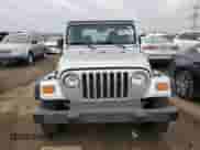 2006 Jeep Wrangler SE z VIN 1J4FA29S66P786288, wystawiony jako Copart lot #49547055 z przebiegiem 141 861 mil mil oraz Czysty tytuł • Clean title. Historia ofert i sprzedaży dostępna na DreamBid. Obrazek 5.