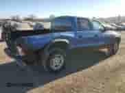 2004 Dodge Dakota Sport z VIN 1D7HL38NX4S789687, wystawiony jako Copart lot #77435824 z przebiegiem 157 993 mil mil oraz Szkoda całkowita • Salvage title. Historia ofert i sprzedaży dostępna na DreamBid. Obrazek 3.