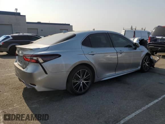 2023 Toyota Camry Hybrid SE with VIN 4T1G31AK6PU618210, listed as a Copart auction lot 64641305 with 21,685 mi miles and Salvage title. Bid and sale history available at DreamBid. Image 3.