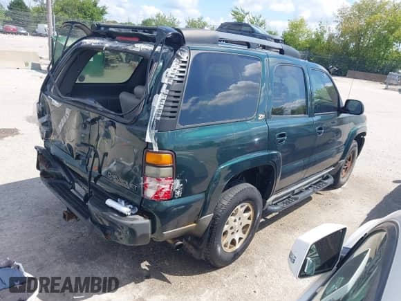 2004 Chevrolet Tahoe Z71 with VIN 1GNEK13ZX4R209898, listed as a IAAI auction lot 42980651 with 196,173 mi miles and . Bid and sale history available at DreamBid. Image 4.