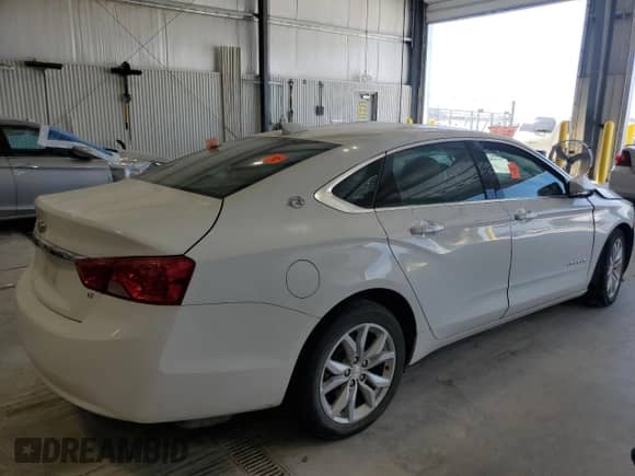 2018 Chevrolet Impala LT with VIN 2G1105S32J9143833, listed as a Copart auction lot 71262125 with Not provided miles and Salvage title. Bid and sale history available at DreamBid. Image 3.