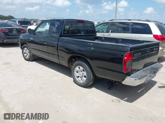 2000 Nissan Frontier XE with VIN 1N6DD26S7YC359637, listed as a IAAI auction lot 42752725 with 340,199 mi miles and . Bid and sale history available at DreamBid. Image 3.