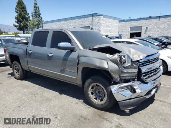 2017 Chevrolet Silverado 1500 LTZ with VIN 3GCPCSEC7HG211899, listed as a Copart auction lot 67068205 with 96,575 mi miles and Salvage title. Bid and sale history available at DreamBid. Image 4.