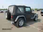 2003 Jeep Wrangler X z VIN 1J4FA39S23P359983, wystawiony jako Copart lot #59469005 z przebiegiem 118 585 mil mil oraz Czysty tytuł • Clean title. Historia ofert i sprzedaży dostępna na DreamBid. Obrazek 3.