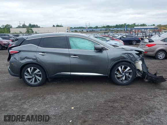 2015 Nissan Murano S with VIN 5N1AZ2MH0FN215679, listed as a IAAI auction lot 42900906 with 144,047 mi miles and . Bid and sale history available at DreamBid. Image 13.