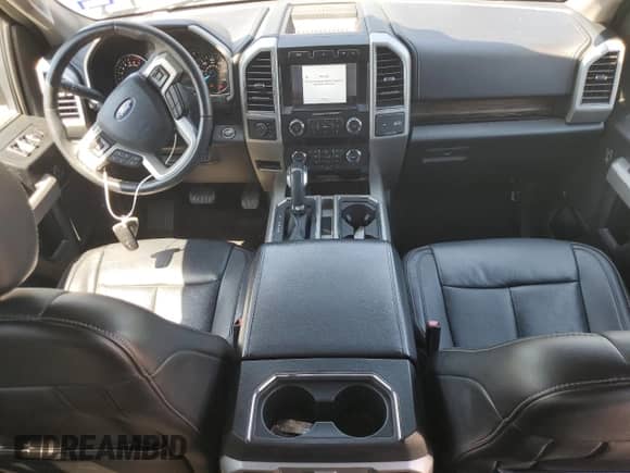 2020 Ford F-150 XLT с VIN 1FTEW1E53LFA64016, выставлен на аукционе Copart как лот 69876945 с пробегом 113 846 миль миль и Списание • Salvage title. История ставок и продаж доступна на DreamBid. Изображение 8.