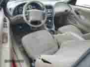 2000 Ford Mustang z VIN 1FAFP404XYF203704, wystawiony jako Copart lot #82164785 z przebiegiem 250 248 mil mil oraz Szkoda całkowita • Salvage title. Historia ofert i sprzedaży dostępna na DreamBid. Obrazek 8.