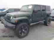 2007 Jeep Wrangler Unlimited Sahara z VIN 1J4GA59147L218594, wystawiony jako IAAI lot #42984397 z przebiegiem 108 296 mil mil oraz . Historia ofert i sprzedaży dostępna na DreamBid. Obrazek 2.