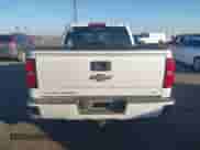 2016 Chevrolet Silverado 1500 LT z VIN 3GCUKREC5GG276375, wystawiony jako IAAI lot #43577857 z przebiegiem 125 238 mil mil oraz . Historia ofert i sprzedaży dostępna na DreamBid. Obrazek 16.