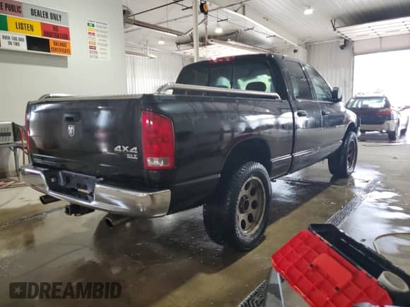 2005 Dodge 1500 SLT z VIN 1D7HU18D35S240519, wystawiony jako Copart lot #84366215 z przebiegiem 176 905 mil mil oraz Szkoda całkowita • Salvage title. Historia ofert i sprzedaży dostępna na DreamBid. Obrazek 3.