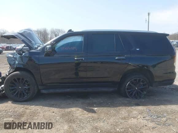 2021 Cadillac Escalade Premium Luxury z VIN 1GYS4BKL8MR488044, wystawiony jako IAAI lot #42084029 z przebiegiem 42 817 mil mil oraz . Historia ofert i sprzedaży dostępna na DreamBid. Obrazek 14.