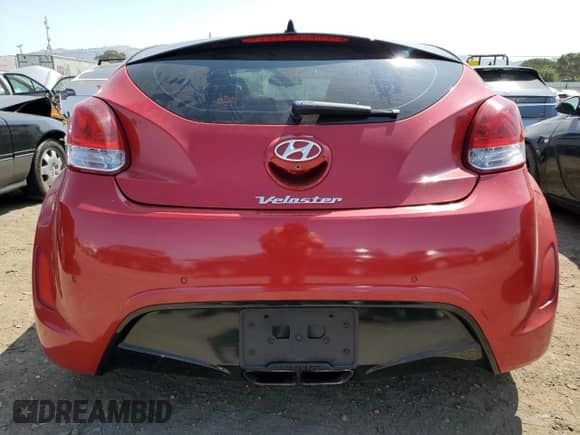 2012 Hyundai Veloster w/Red Int с VIN KMHTC6AD4CU054208, выставлен на аукционе Copart как лот 62169895 с пробегом 61 088 миль миль и Списание • Salvage title. История ставок и продаж доступна на DreamBid. Изображение 6.