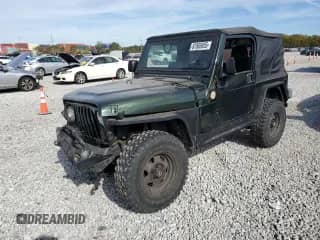 2004 Jeep Wrangler X z VIN 1J4FA39S94P716559, wystawiony jako Copart lot #87065855 z przebiegiem Nie podano mil oraz Szkoda całkowita • Salvage title. Historia ofert i sprzedaży dostępna na DreamBid. Obrazek 1.