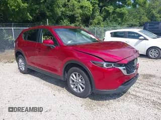 2023 Mazda CX-5 S Carbon Edition z VIN JM3KFBCM4P0239778, wystawiony jako IAAI lot #42856157 z przebiegiem 17 778 mil mil oraz . Historia ofert i sprzedaży dostępna na DreamBid. Obrazek 1.