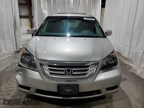 2009 Honda Odyssey EX with VIN 5FNRL38499B002772, listed as a Copart auction lot 59592625 with 100,524 mi miles and Salvage title. Bid and sale history available at DreamBid. Image 5.