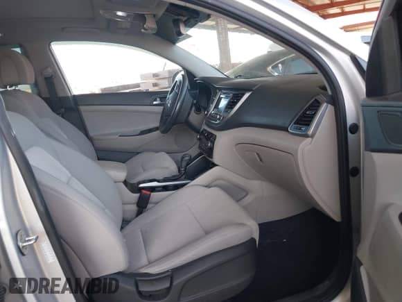 2017 Hyundai Tucson Sport with VIN KM8J33A25HU558097, listed as a IAAI auction lot 42292516 with 132,957 mi miles and . Bid and sale history available at DreamBid. Image 5.